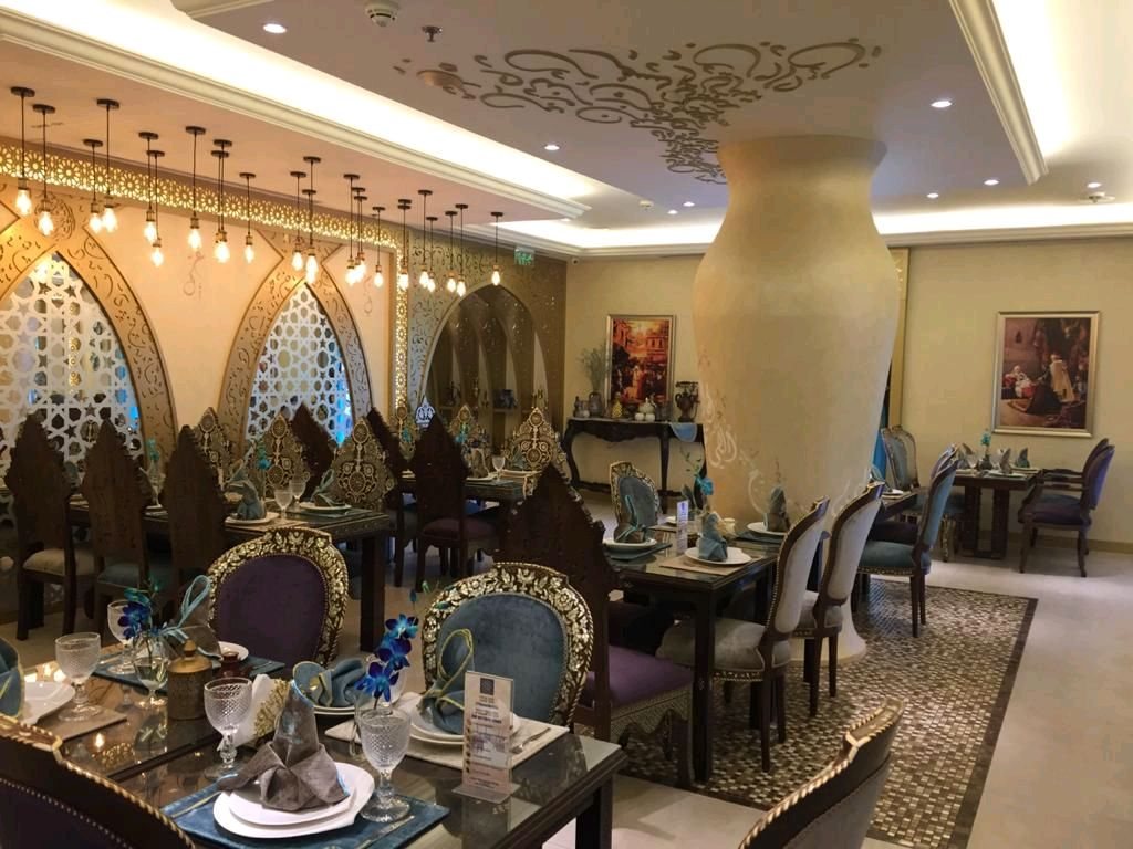 Regal Dining with Ornate Screens - Luxury Dining Spaces by Pro Fit